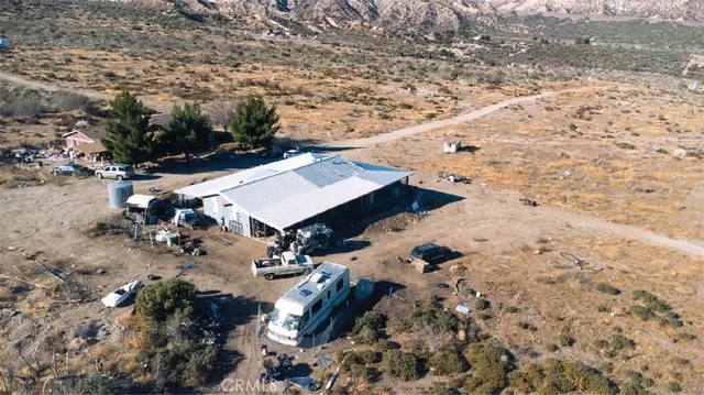 a view of a backyard of a house
