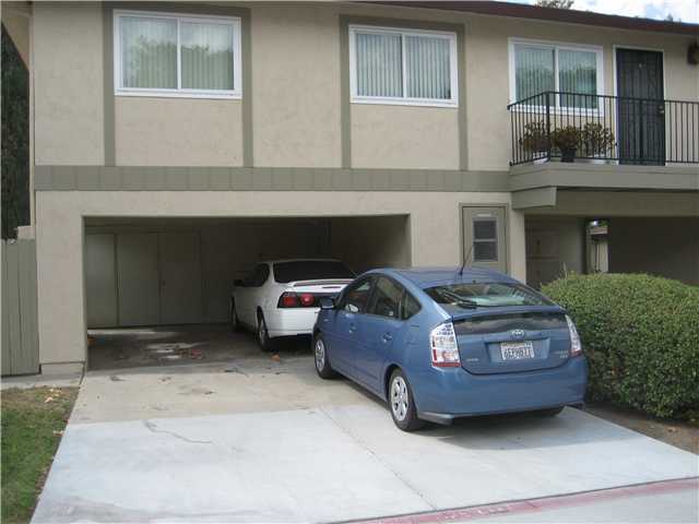 2 Car tandem facing rear it's the inside left space. 3 storage spaces in garage. Laundry room is door to the right of the blue car.