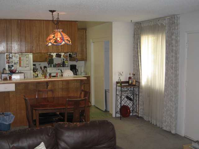 Dining area & Kitchen Fridge & Stove convey.