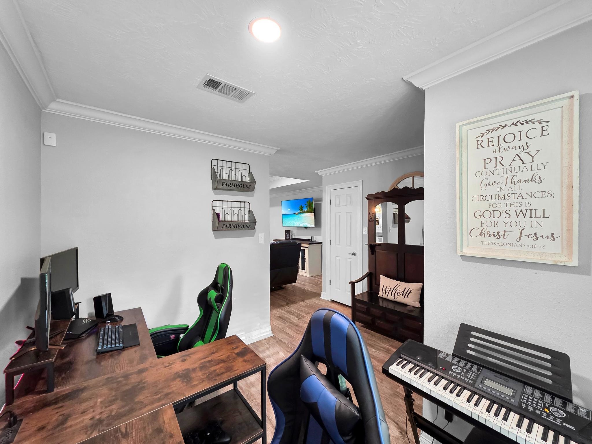 2641 Oilla Road Orange, TX 77630 - Photo 30 of 50 a living room with furniture and a piano