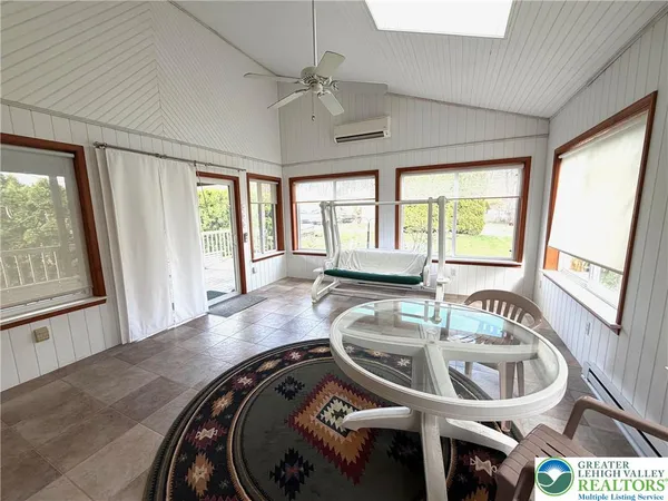 a room with furniture and window