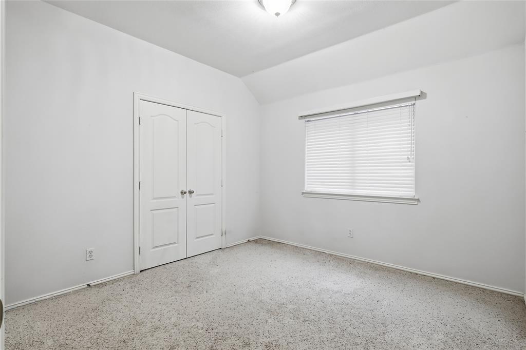 2216 Post Oak Court Corinth, TX 76210 - Photo 17 of 19 an empty room with a window