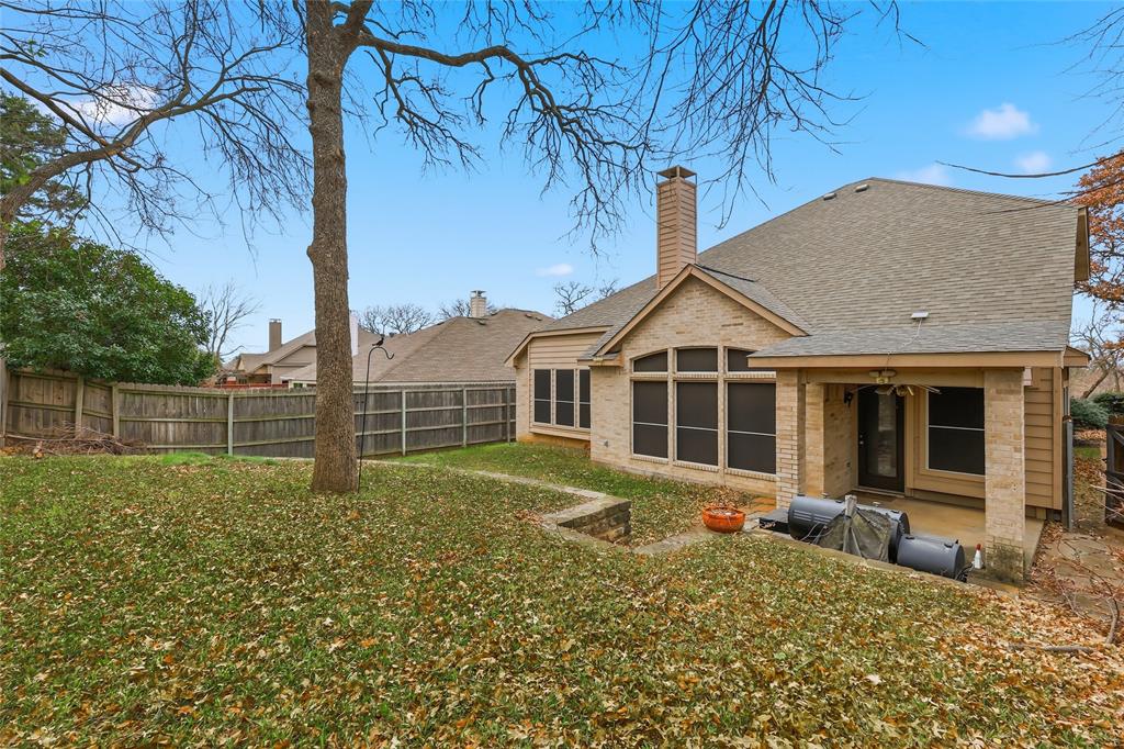 2216 Post Oak Court Corinth, TX 76210 - Photo 19 of 19 a view of a house with backyard and garden