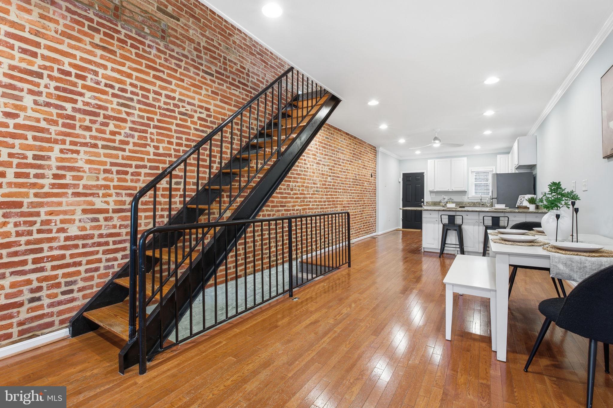 3135 Fait Avenue Baltimore, MD 21224 - Photo 11 of 35 a view of kitchen with cabinets and wooden floor
