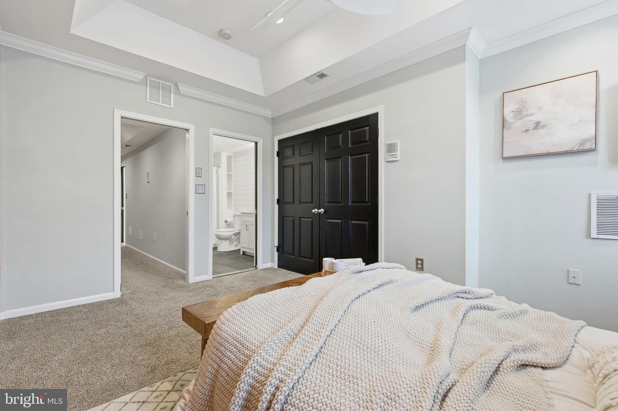 3135 Fait Avenue Baltimore, MD 21224 - Photo 15 of 35 a bedroom with a bed and a mirror