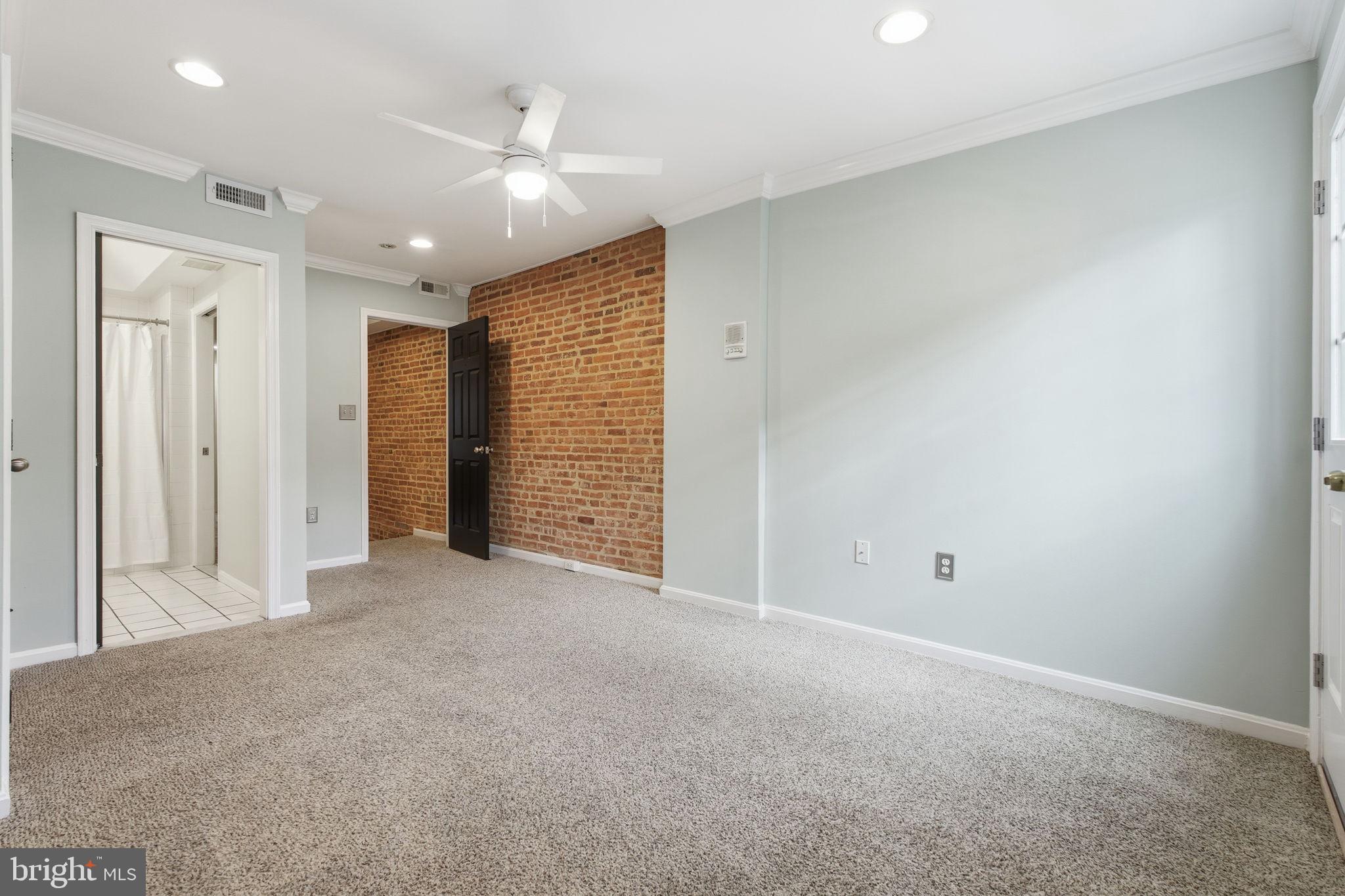 3135 Fait Avenue Baltimore, MD 21224 - Photo 17 of 35 an empty room with closet and a ceiling fan