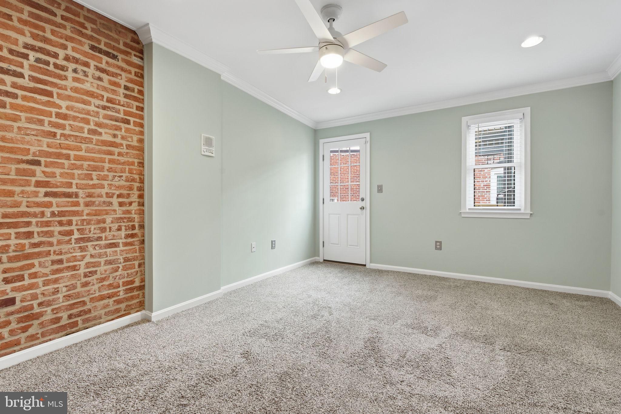 3135 Fait Avenue Baltimore, MD 21224 - Photo 19 of 35 a view of an empty room with a window
