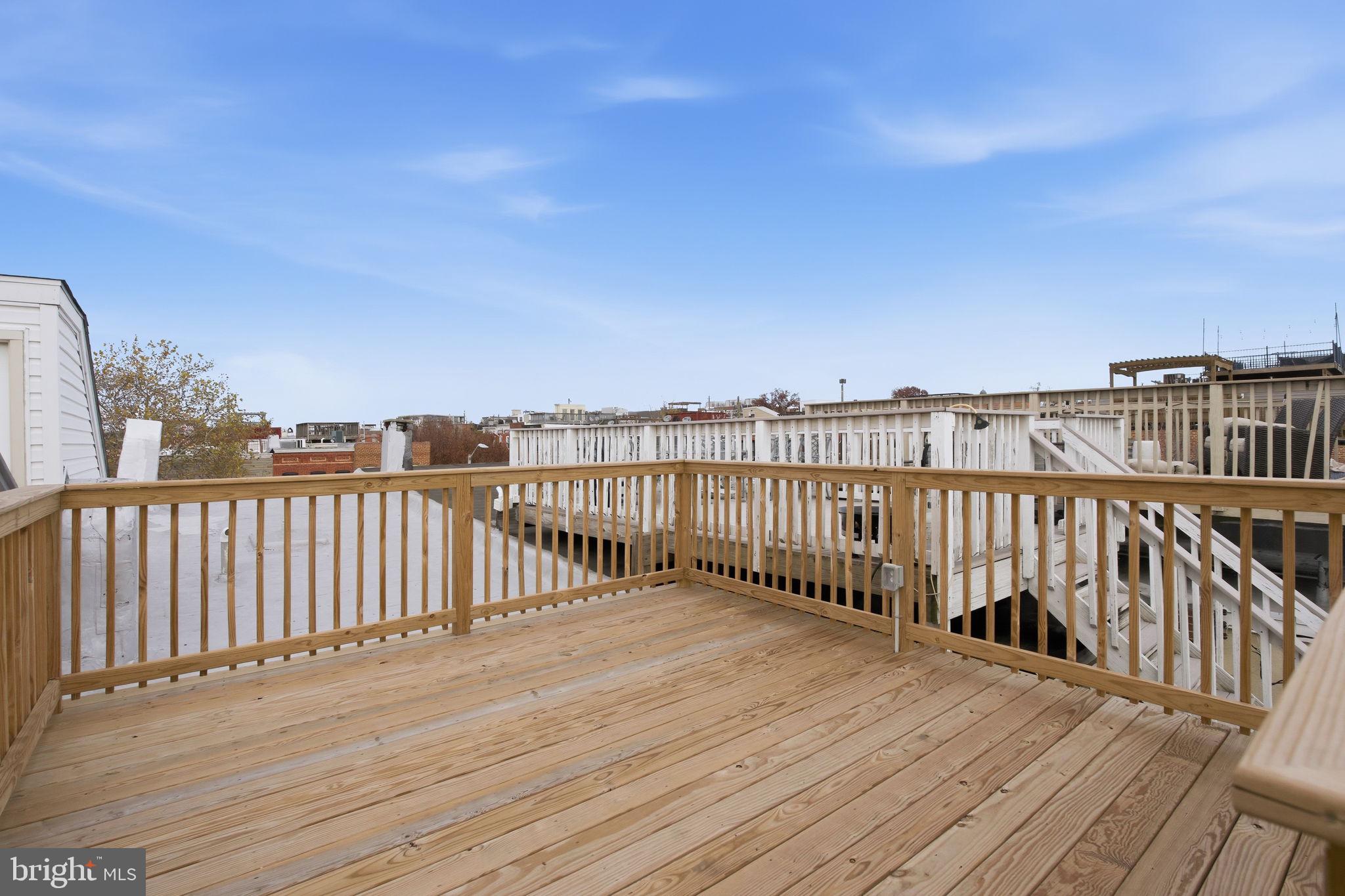 3135 Fait Avenue Baltimore, MD 21224 - Photo 30 of 35 a view of terrace with wooden floor and fence