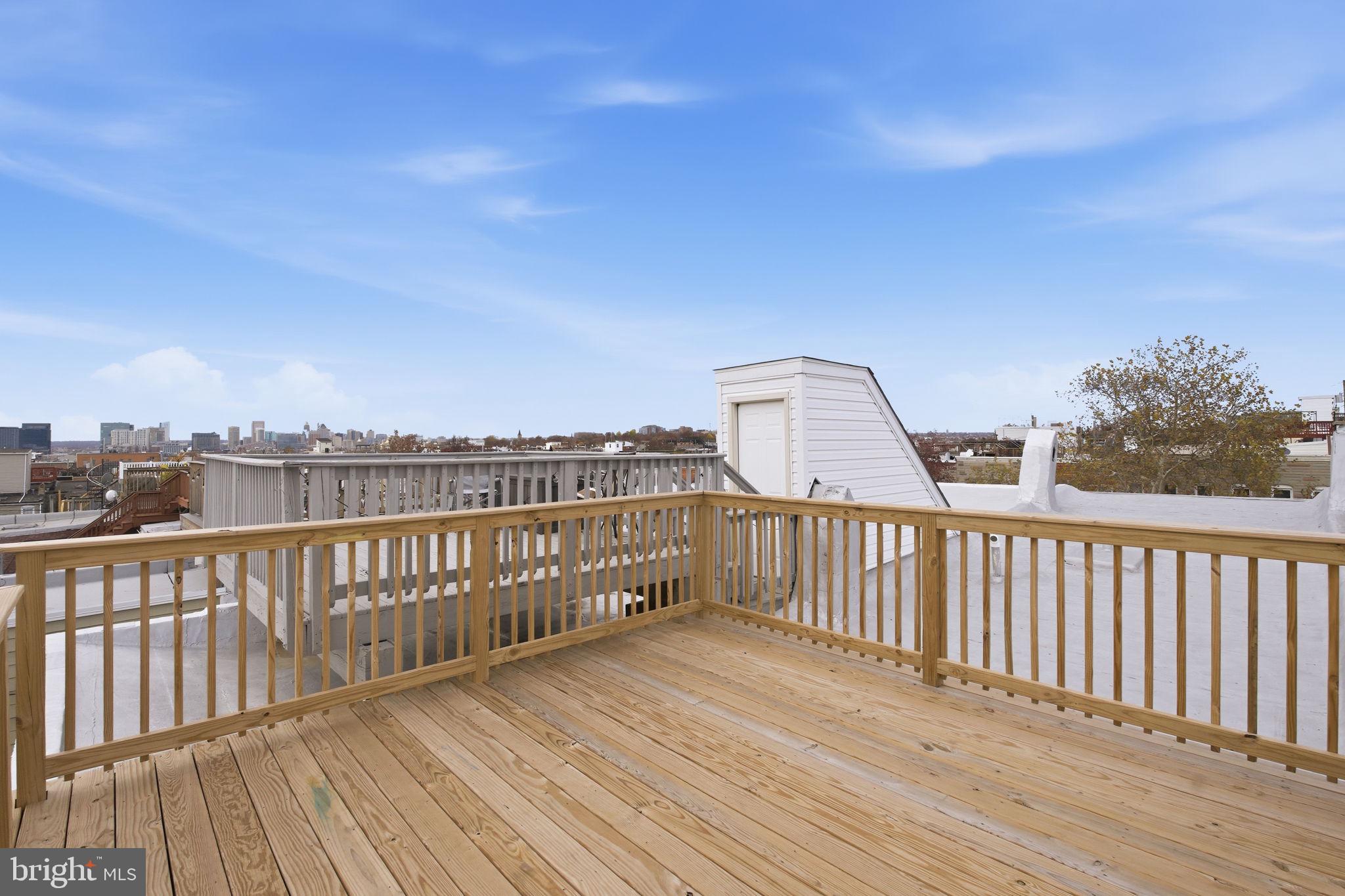 3135 Fait Avenue Baltimore, MD 21224 - Photo 32 of 35 a view of a balcony with wooden floor