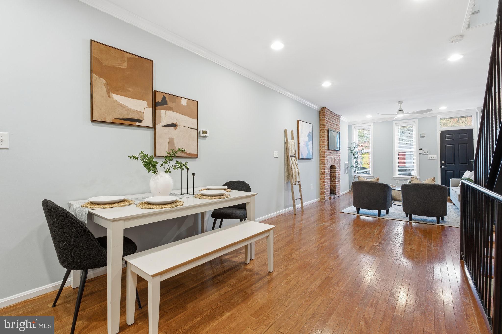 3135 Fait Avenue Baltimore, MD 21224 - Photo 8 of 35 a view of a dining room with furniture and wooden floor