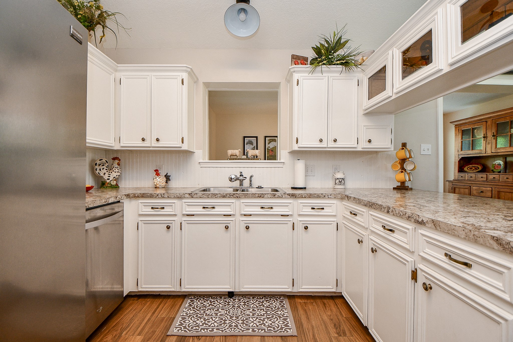 606 Walnut Street Sweeny, TX 77480 - Photo 12 of 28 A cooks dream kitchen with so much open working space on the new beautiful countertops! And look at all that cabinet storage!