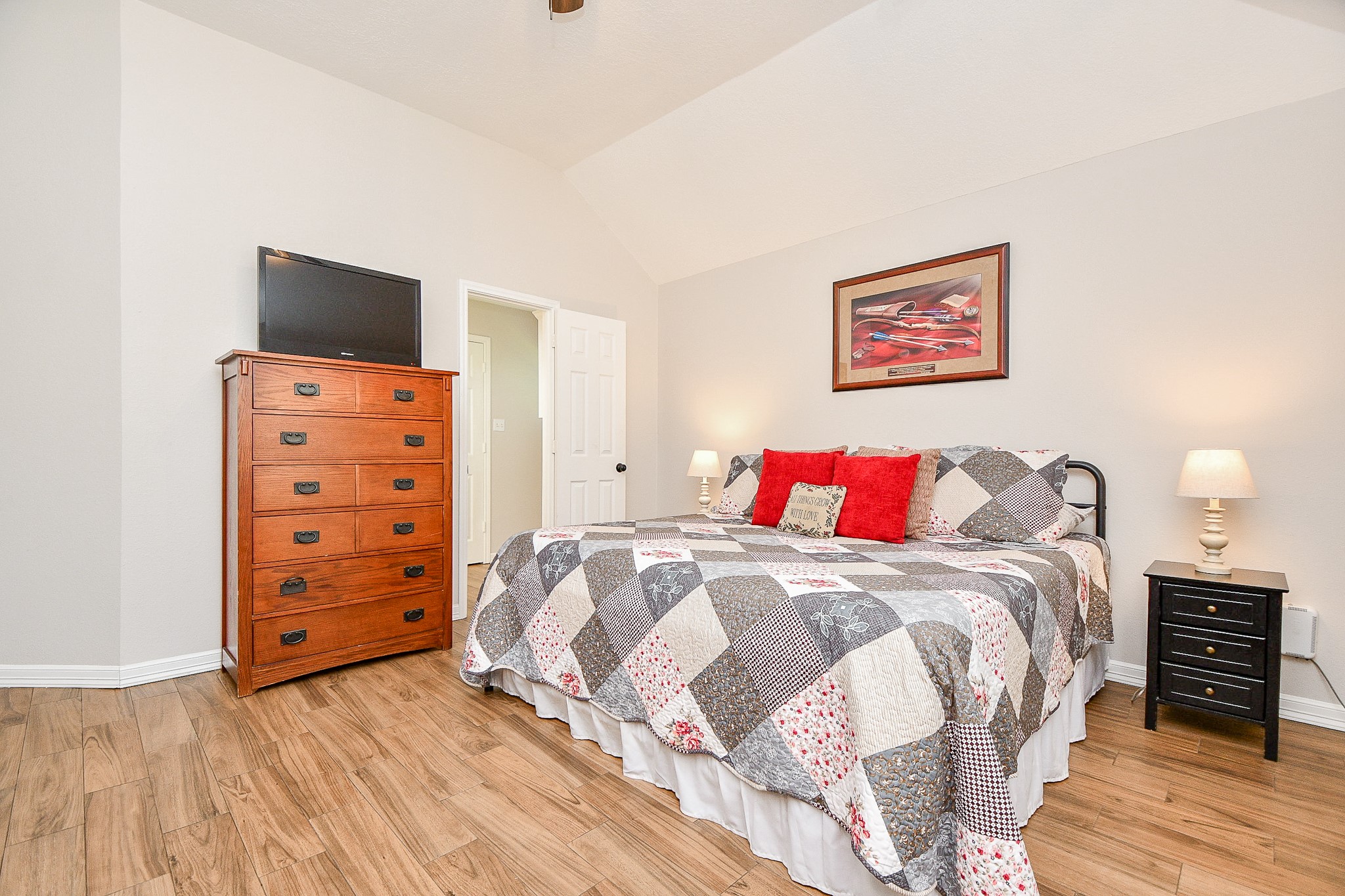 606 Walnut Street Sweeny, TX 77480 - Photo 15 of 28 The Master Bedroom and en suite are located at the far end of the house (away from the living area) to ensure peace and quiet