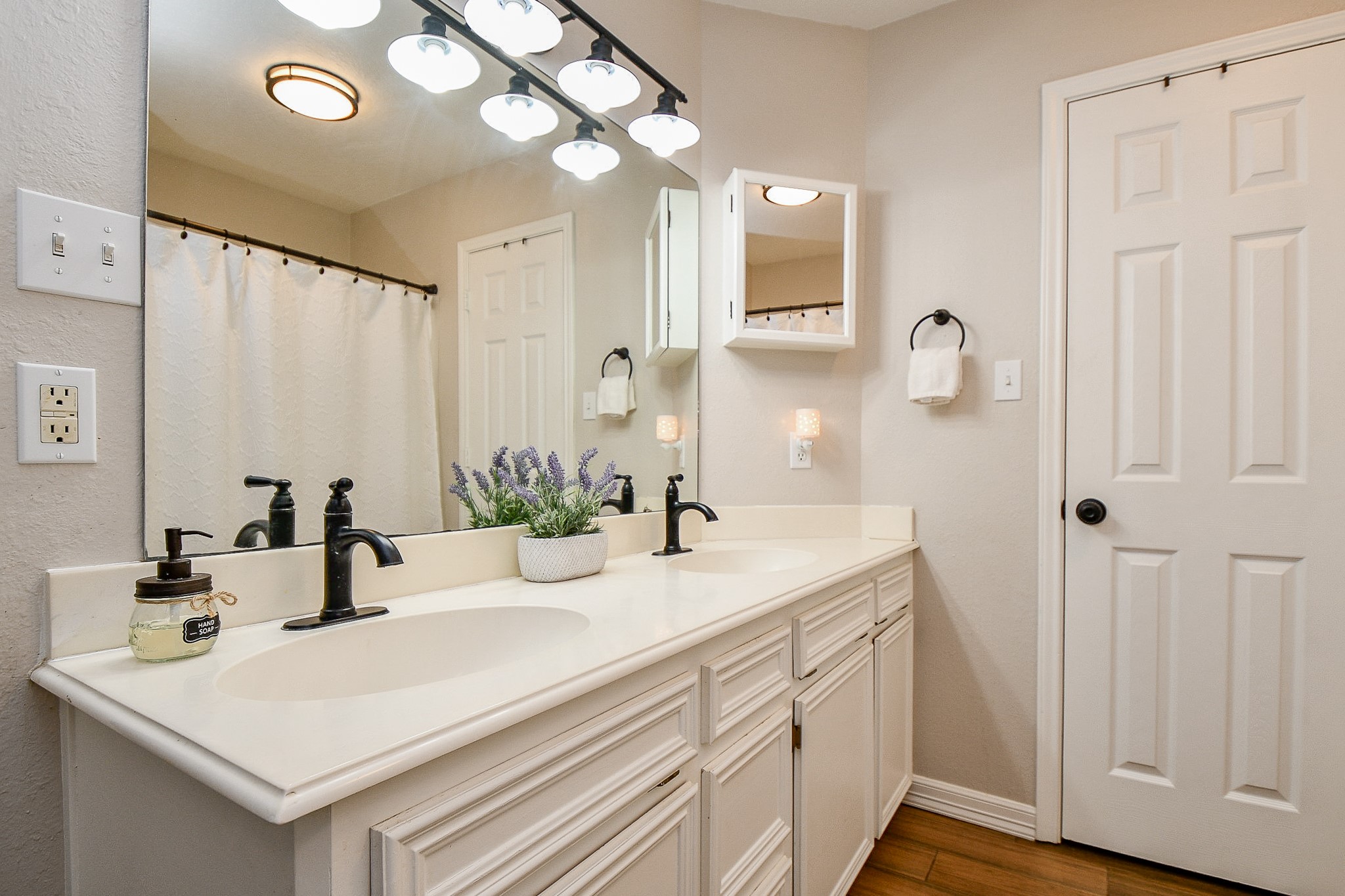 606 Walnut Street Sweeny, TX 77480 - Photo 17 of 28 The Master bath has a linen closet and a walk in closet (not pictured) It is light and bright and has a window at the other end