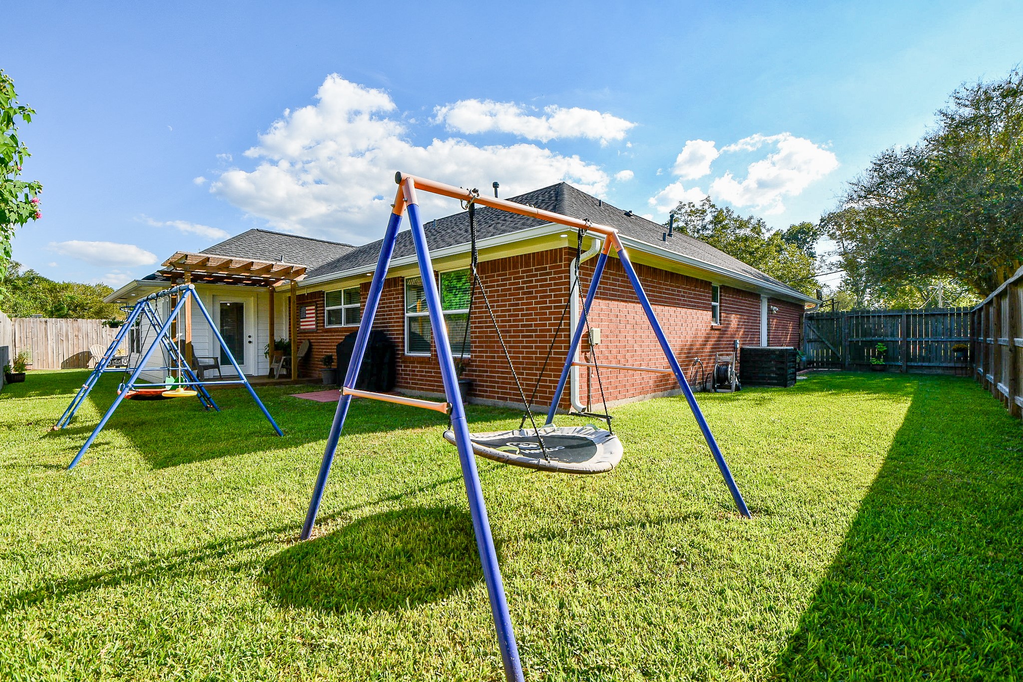 606 Walnut Street Sweeny, TX 77480 - Photo 28 of 28 Children's play area can be viewed from the Back Porch