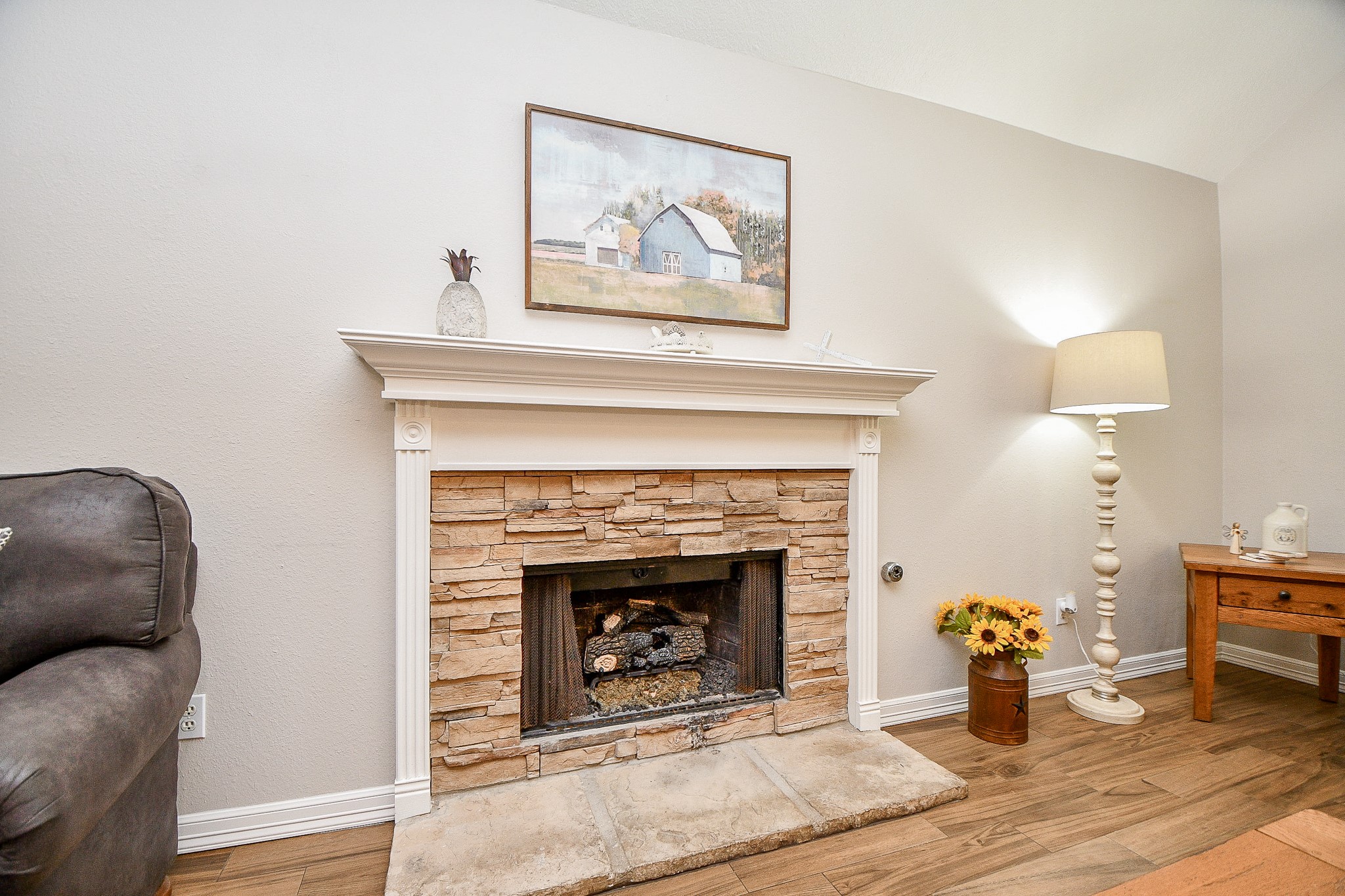 606 Walnut Street Sweeny, TX 77480 - Photo 7 of 28 The fireplace got a makeover and has gas logs, but can be wood burning if desired