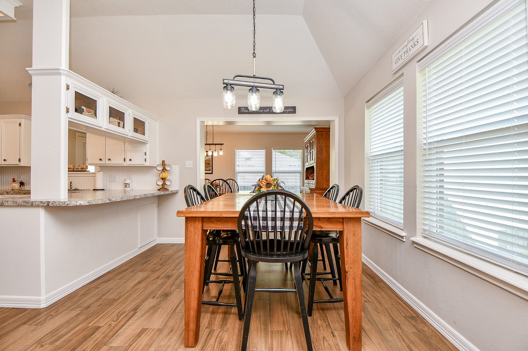 606 Walnut Street Sweeny, TX 77480 - Photo 8 of 28 The Breakfast Nook flows into the Kitchen and Dining Room and has the capacity for additional seating at the bar