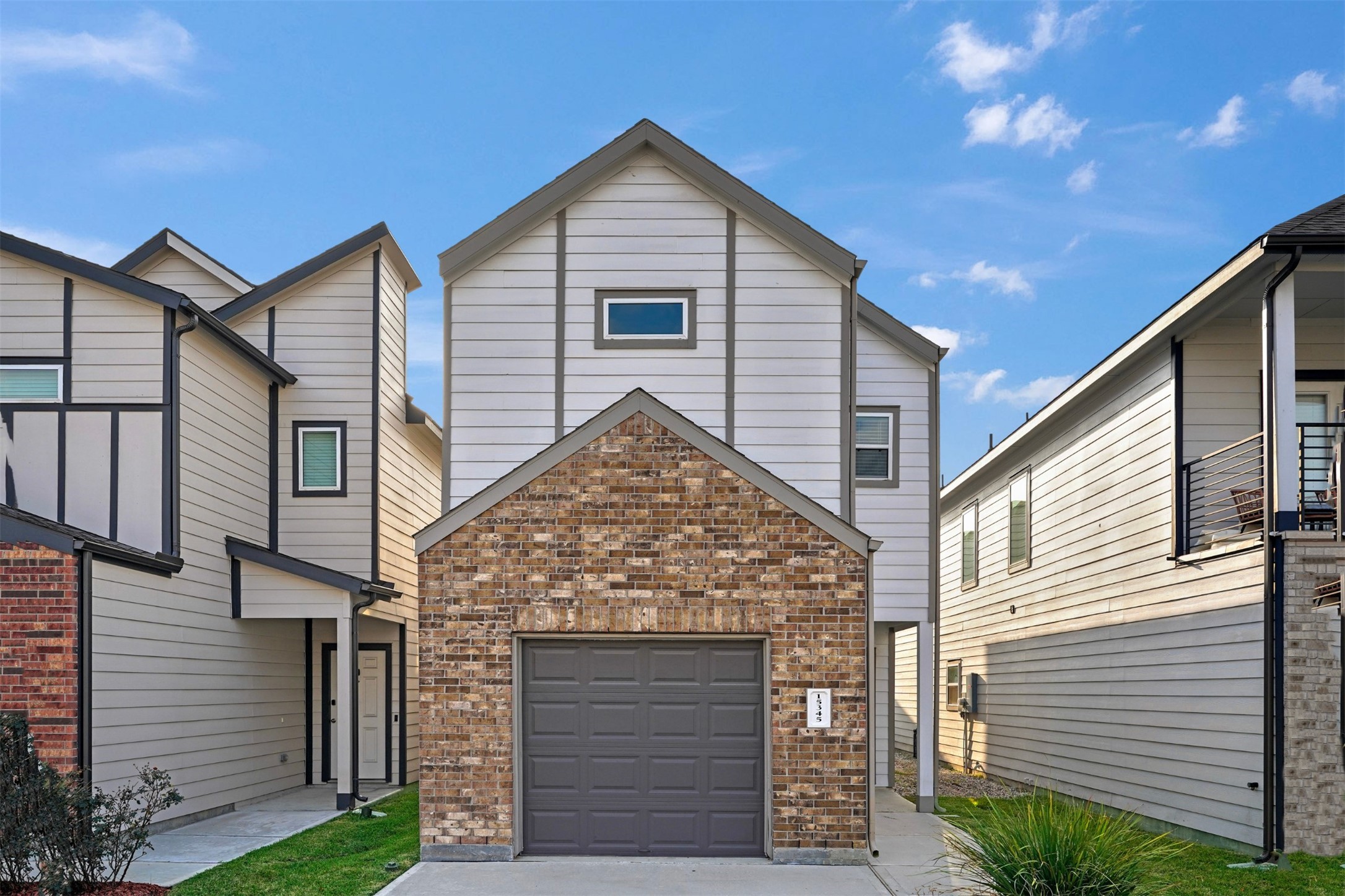 15345 Estrella Road East Houston, TX 77073 - Photo 2 of 16 a view of a house of a house and wooden fence