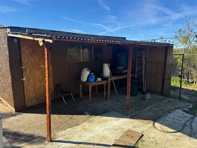 a view of a backyard with plants