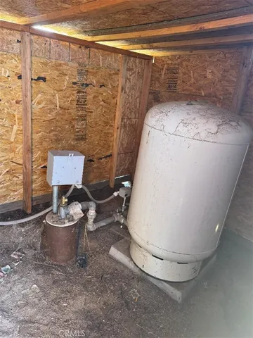 a view of a tree in front of a yard