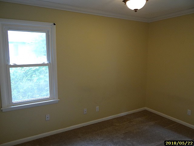 2922 Barbara Road Columbus, GA 31907 - Photo 8 of 10 an empty room with a window