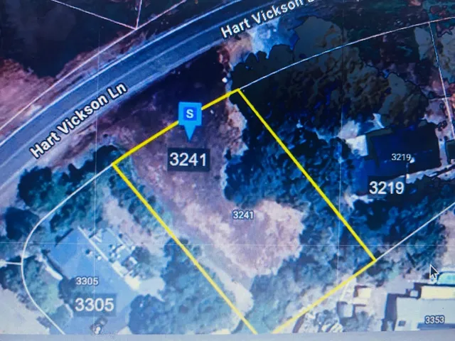 a bed with lots of flowers in it