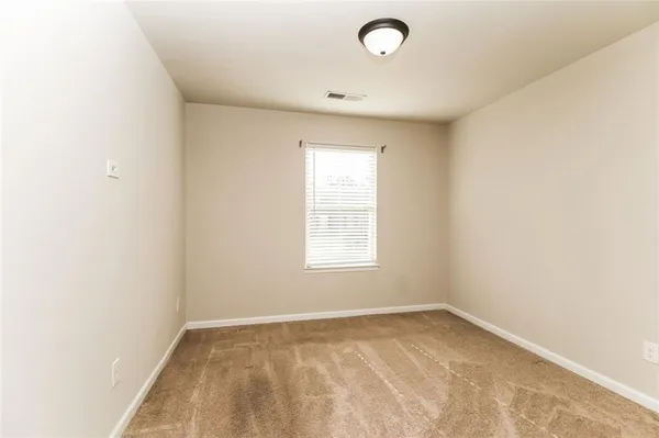 a view of a livingroom with a window