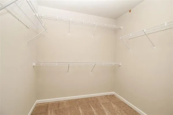a view of a room with racks on the wall