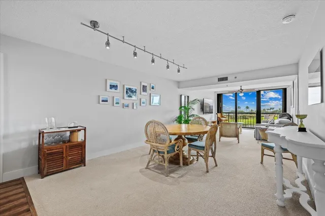 a view of a livingroom with furniture and window