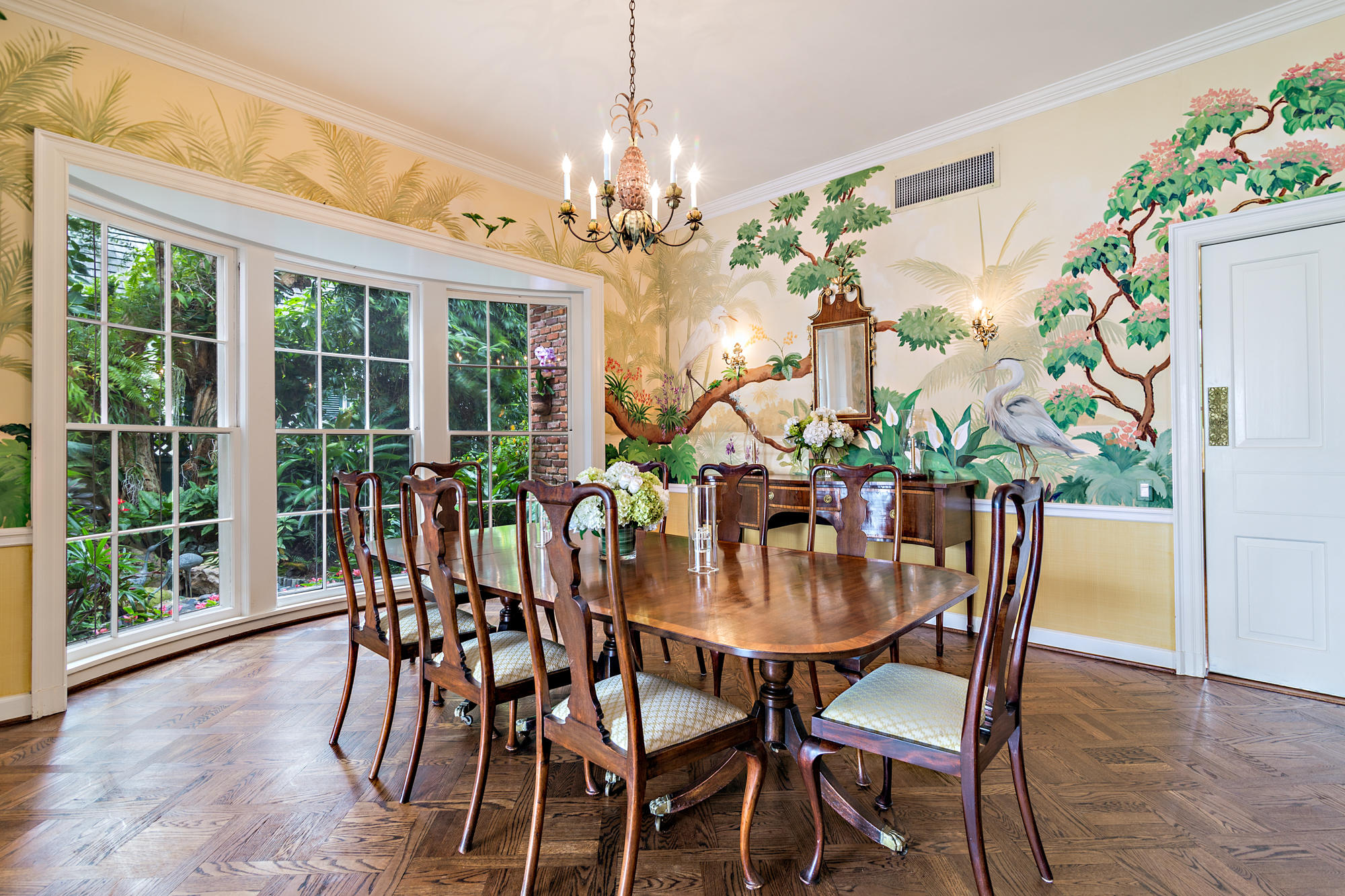 568 Island Drive Palm Beach, FL 33480 - Photo 12 of 34 a view of a dining room with furniture and a chandelier