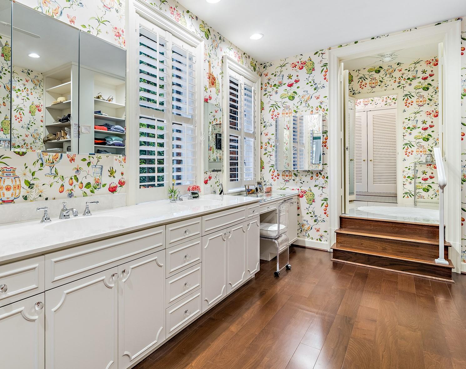 568 Island Drive Palm Beach, FL 33480 - Photo 18 of 34 a spacious bathroom with double vanity and a bathtub
