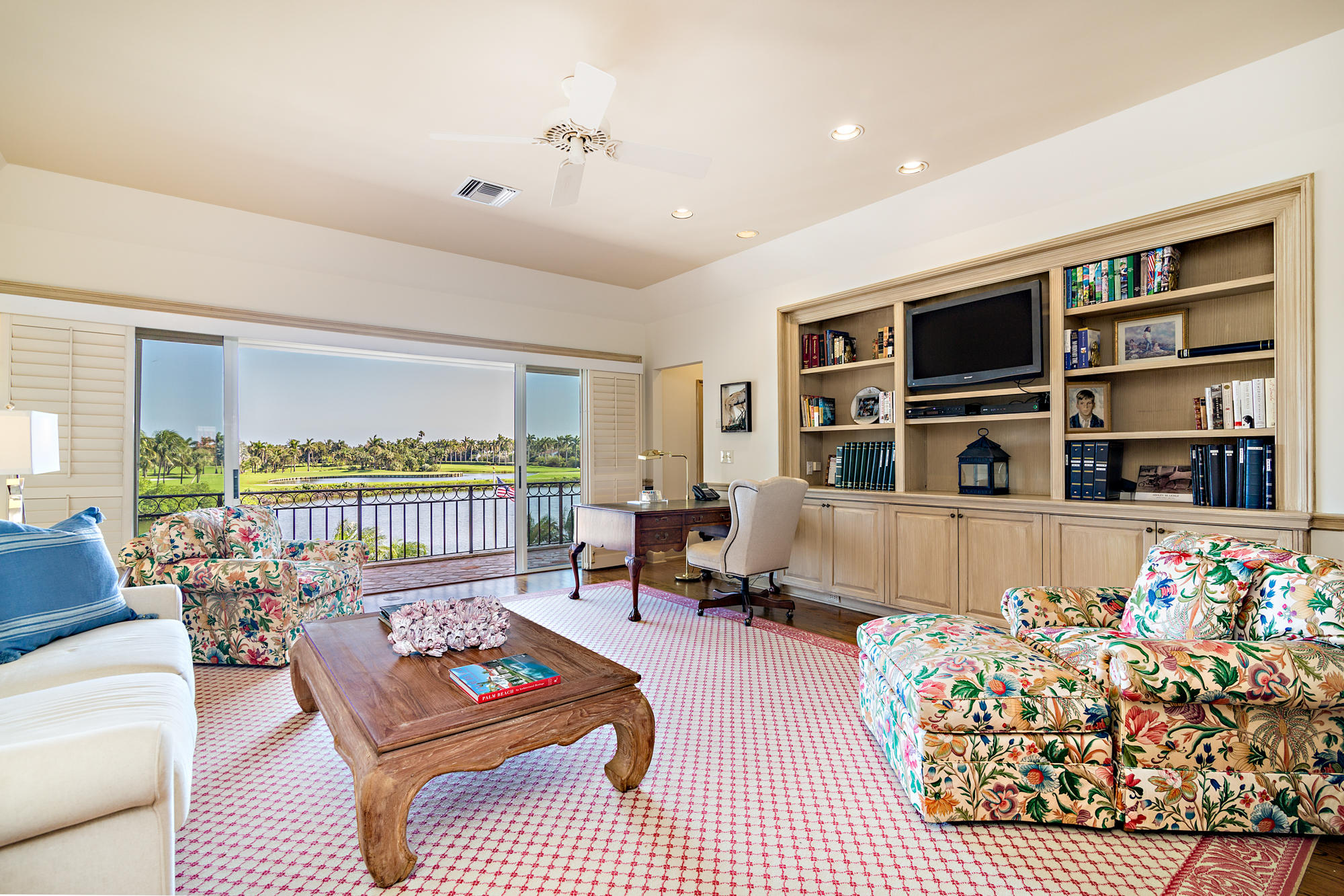 568 Island Drive Palm Beach, FL 33480 - Photo 23 of 34 a living room with furniture floor and a flat screen tv