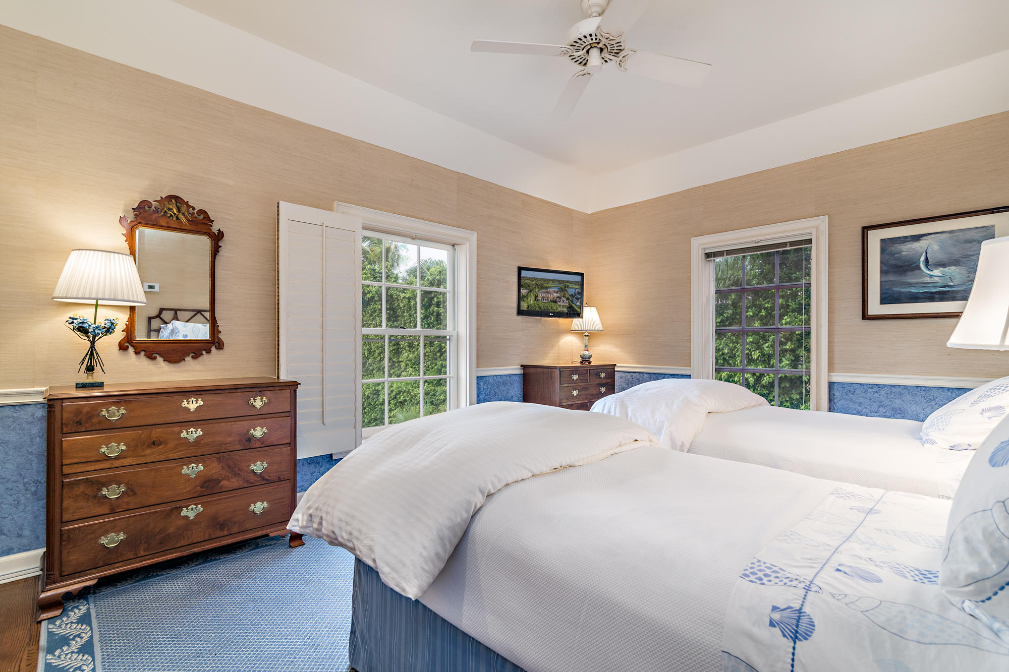 568 Island Drive Palm Beach, FL 33480 - Photo 24 of 34 a bedroom with a bed and a dresser