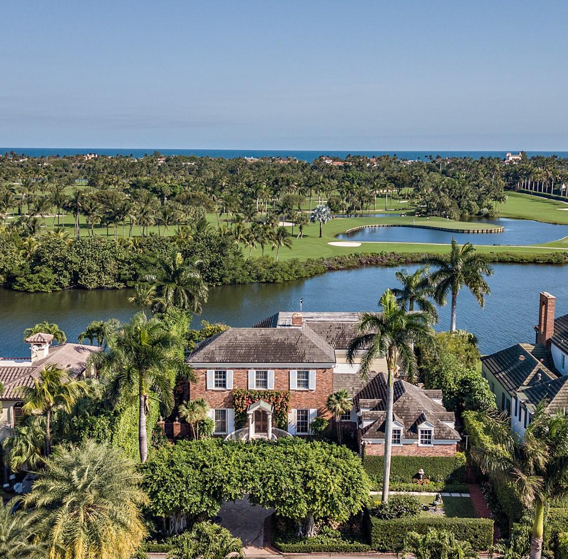 568 Island Drive Palm Beach, FL 33480 - Photo 33 of 34 an aerial view of a house with a lake view