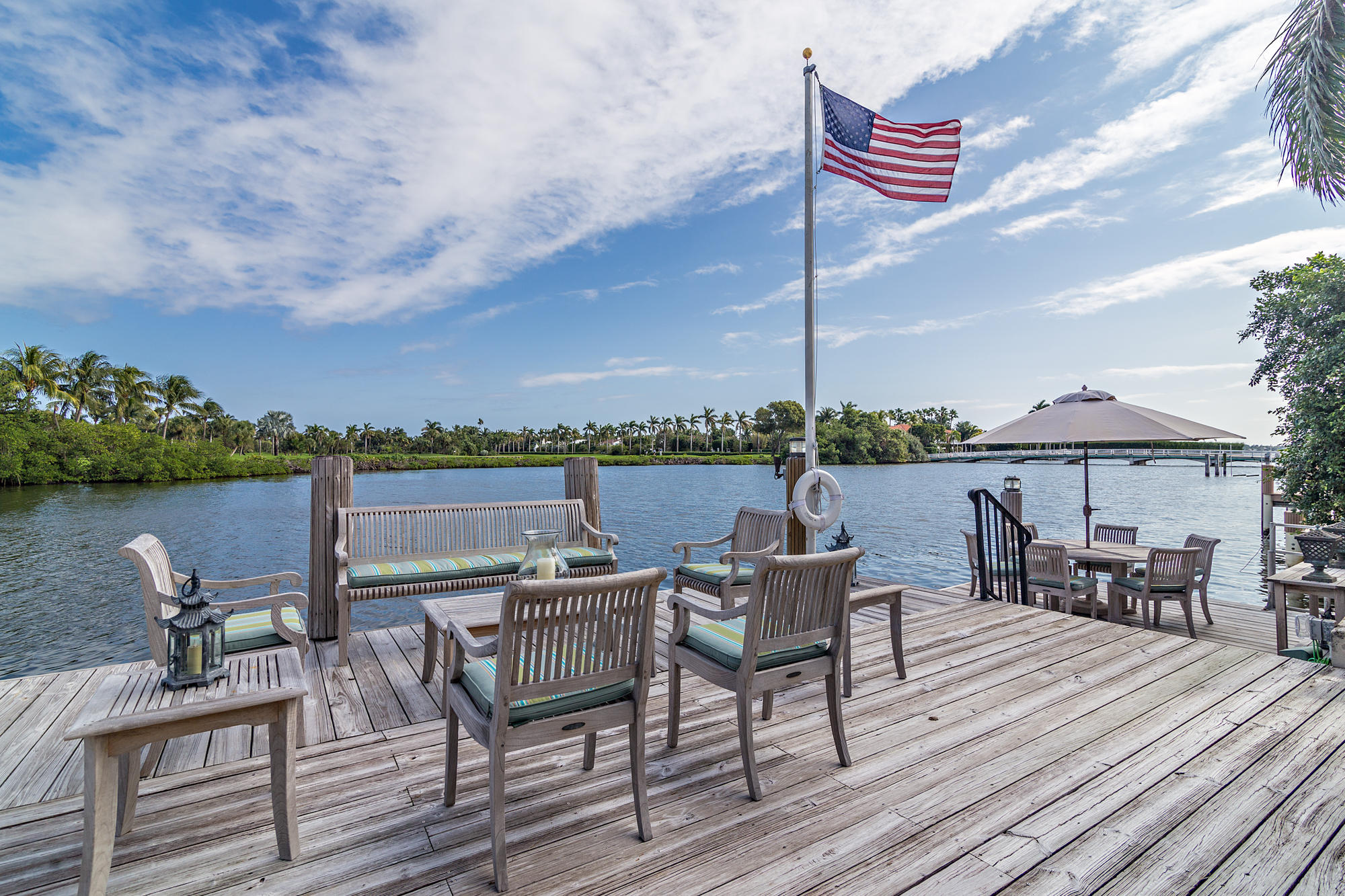 568 Island Drive Palm Beach, FL 33480 - Photo 6 of 34 a view of a terrace with furniture
