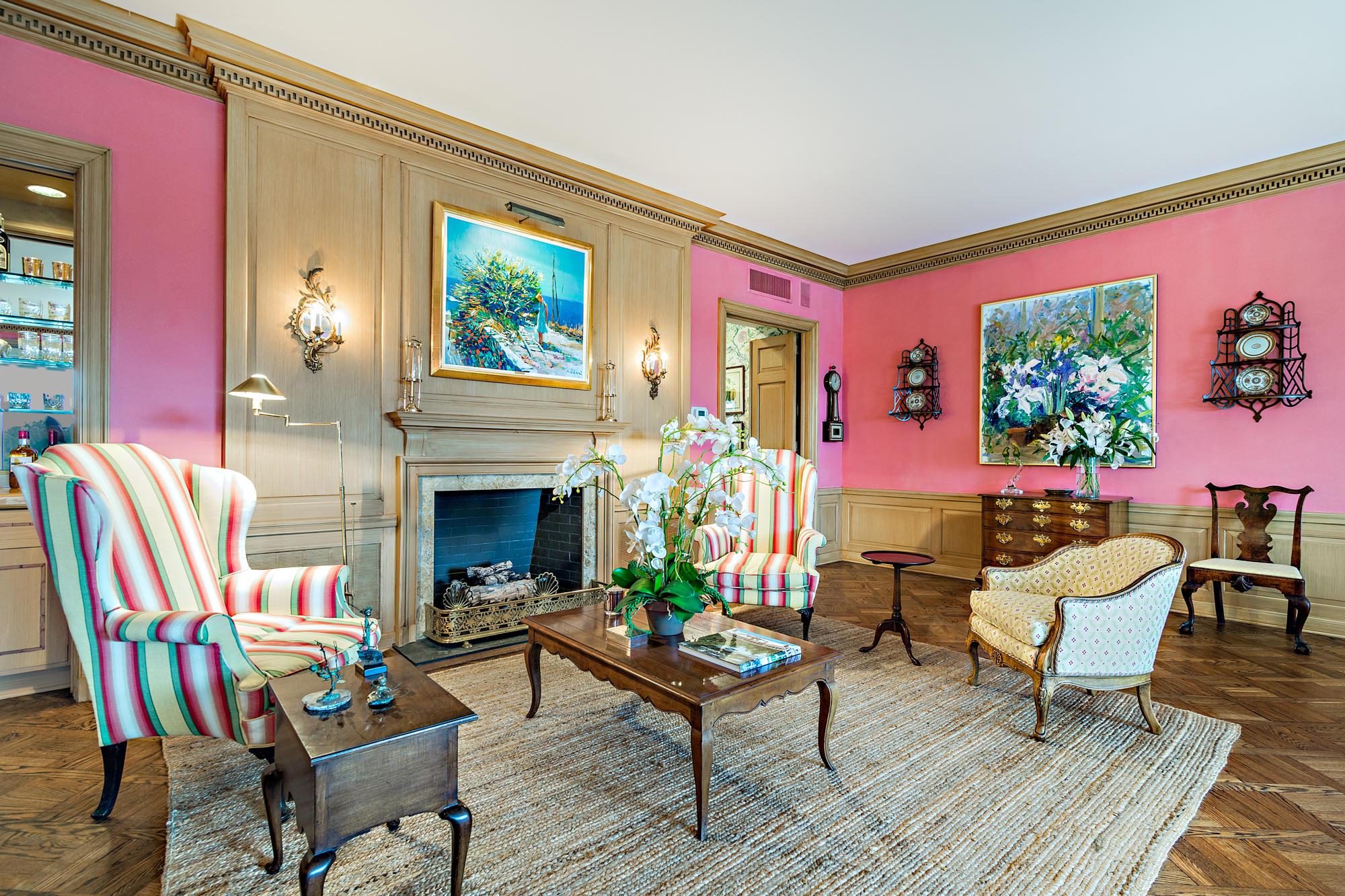 568 Island Drive Palm Beach, FL 33480 - Photo 10 of 34 a living room with furniture a rug and a fireplace