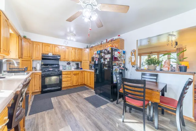 a bedroom with furniture and a flat screen tv