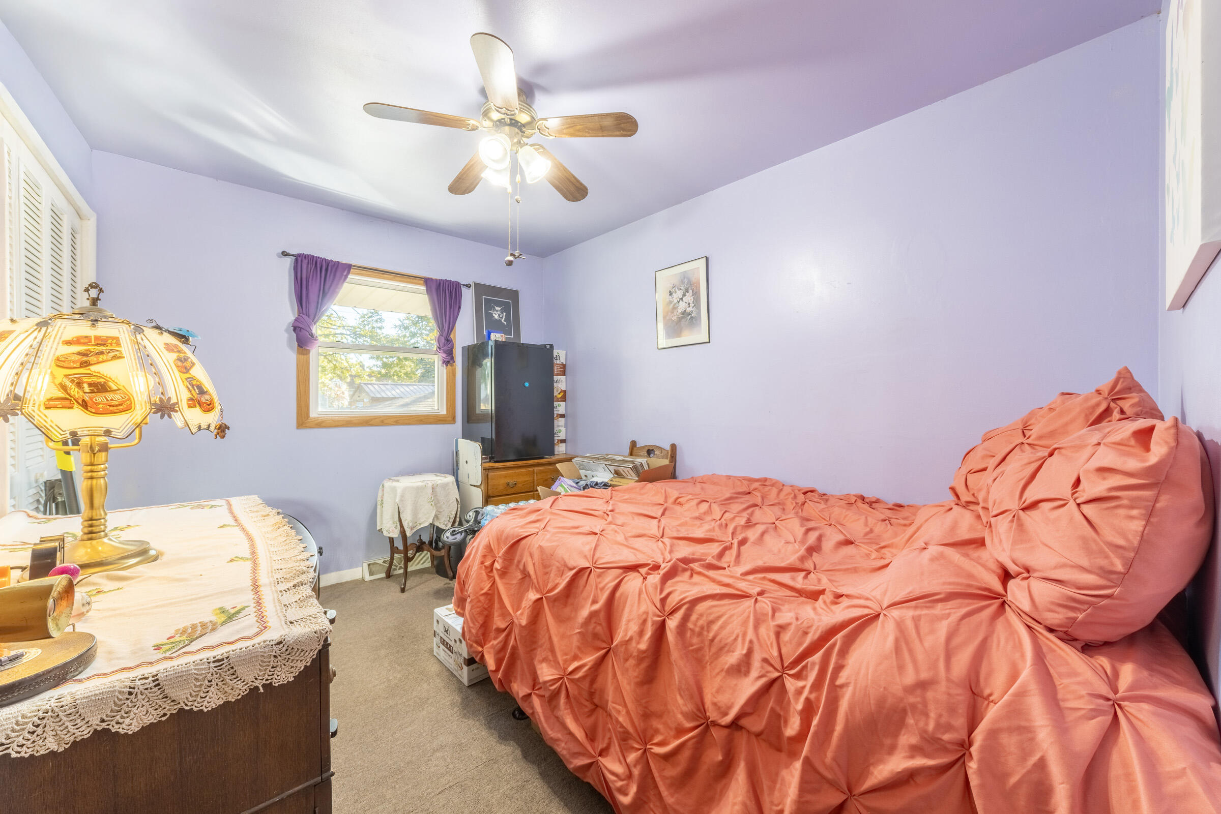 225 North Dwiggins Street Griffith, IN 46319 - Photo 24 of 36 a bedroom with bed and window
