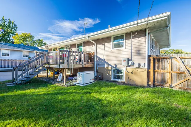 a view of a house with a back yard