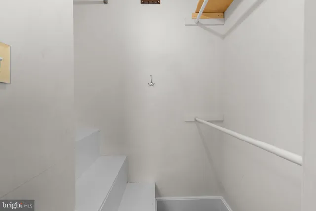 a view of small space with racks on the wall