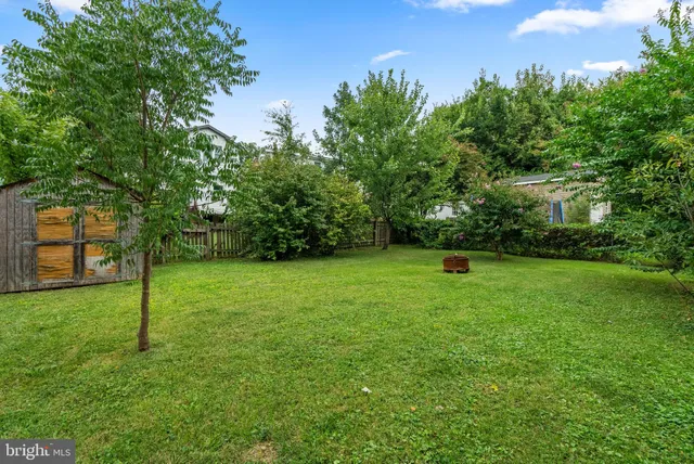 a view of a backyard with a garden