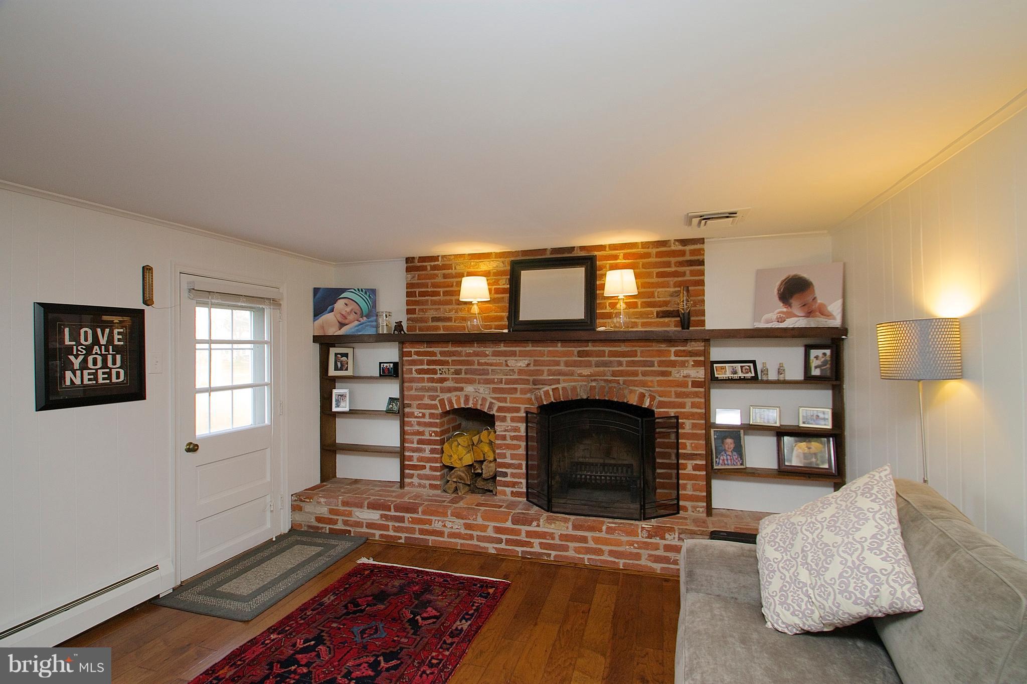 812 Roelofs Road Yardley, PA 19067 - Photo 10 of 36 Brick fireplace surround with built-ins