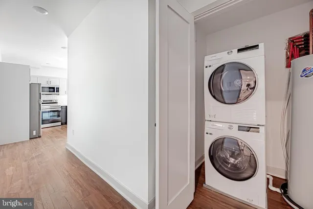 a view of livingroom with washer and dryer