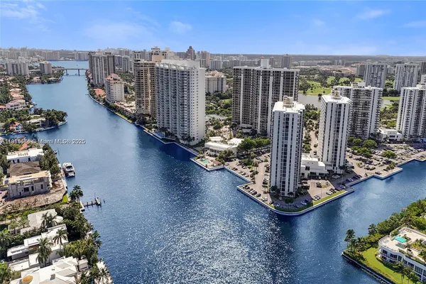 a view of a city with tall buildings