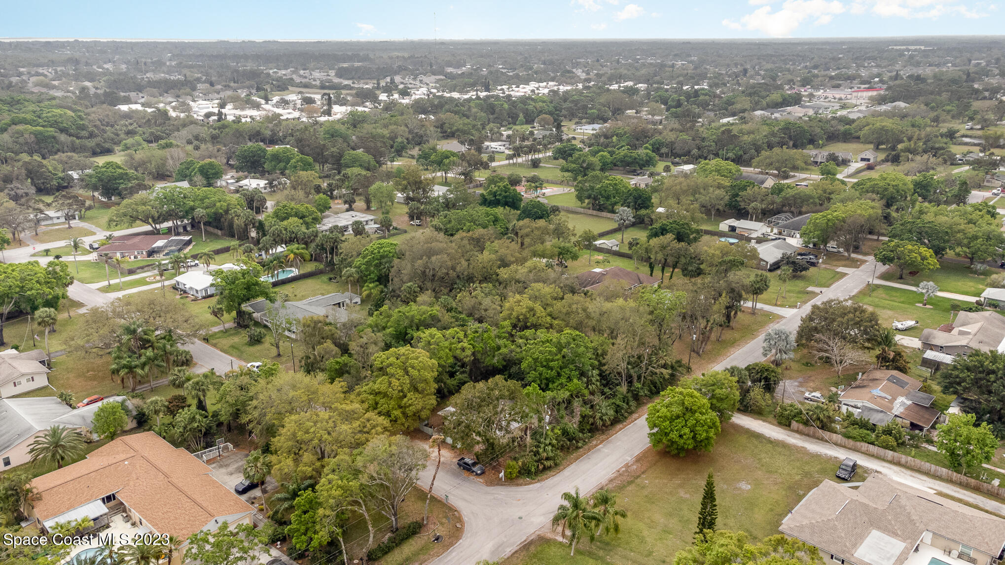1826 Lemay Drive Northeast Palm Bay, FL 32905 - Photo 11 of 31 an aerial view of residential houses with outdoor space