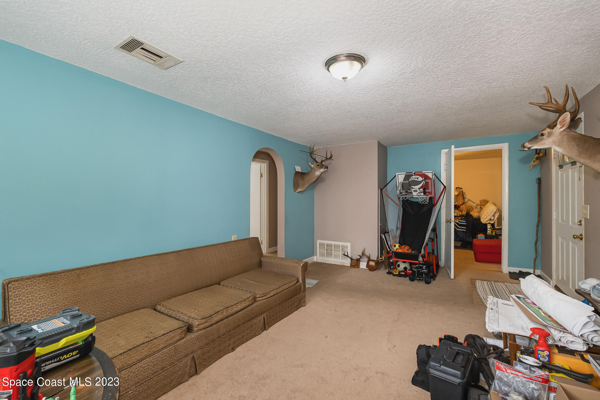1826 Lemay Drive Northeast Palm Bay, FL 32905 - Photo 16 of 31 a view of a room with gym equipment