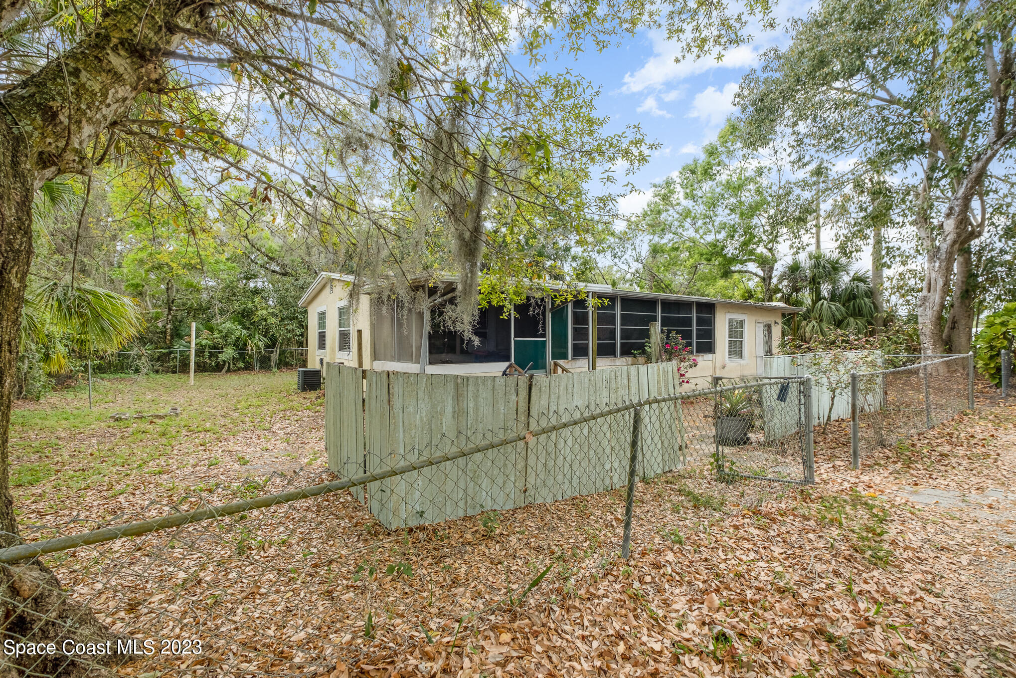 1826 Lemay Drive Northeast Palm Bay, FL 32905 - Photo 2 of 31 a view of a house with a yard