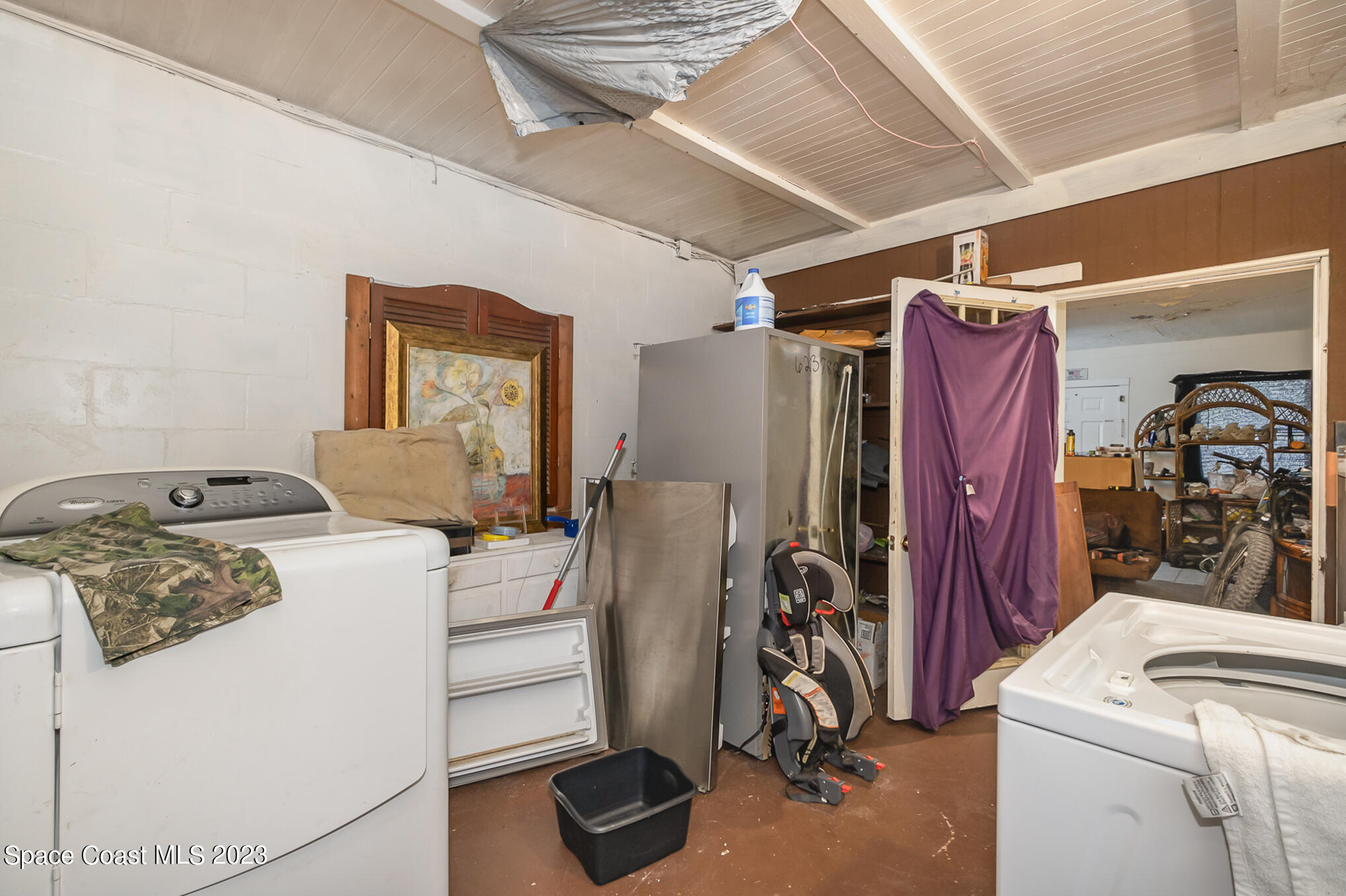 1826 Lemay Drive Northeast Palm Bay, FL 32905 - Photo 27 of 31 a view of a storage & utility room with washer and dryer