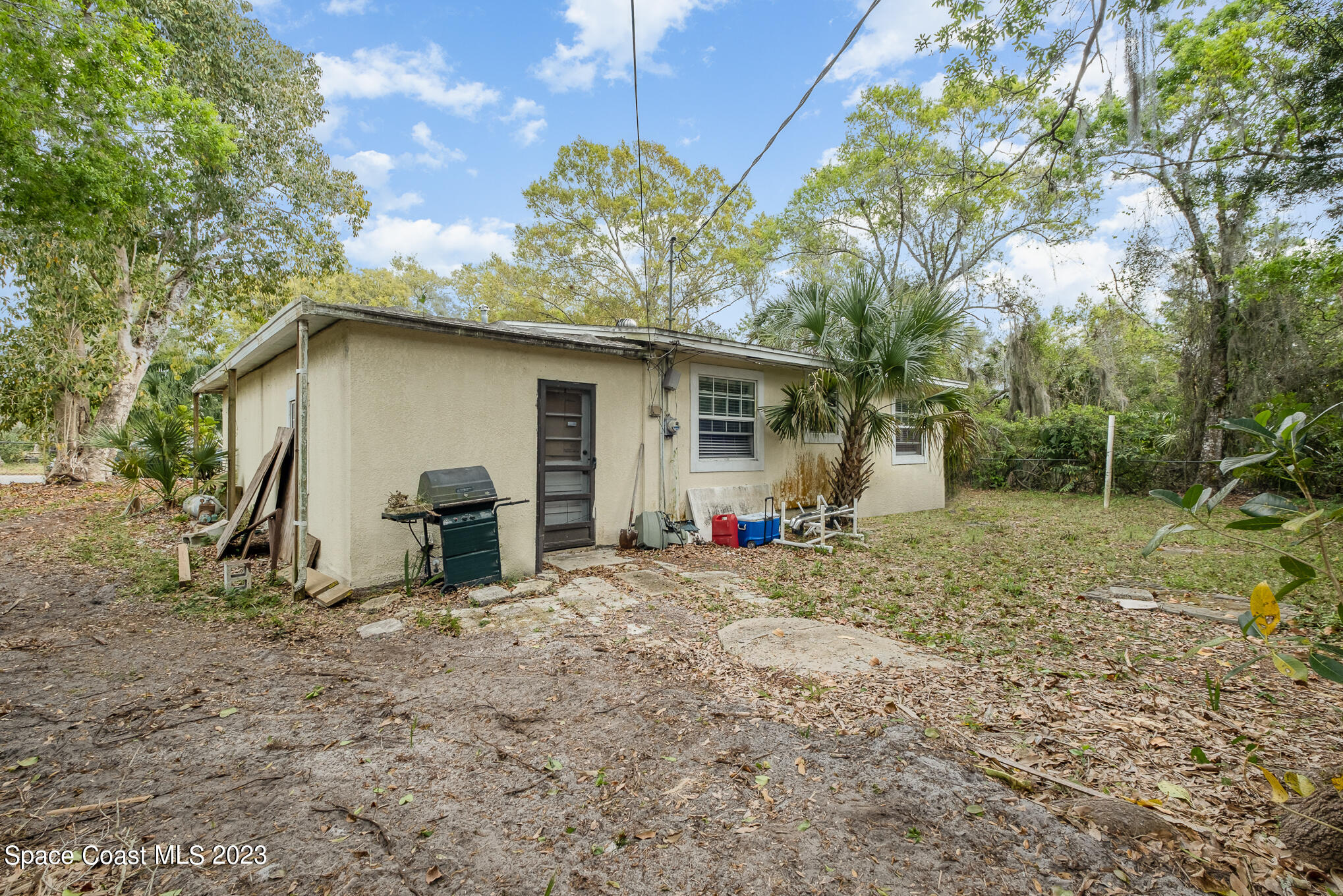 1826 Lemay Drive Northeast Palm Bay, FL 32905 - Photo 5 of 31 a view of a house with backyard
