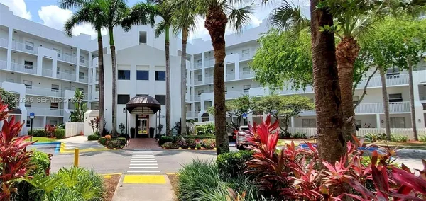 a view of a swimming pool with a garden