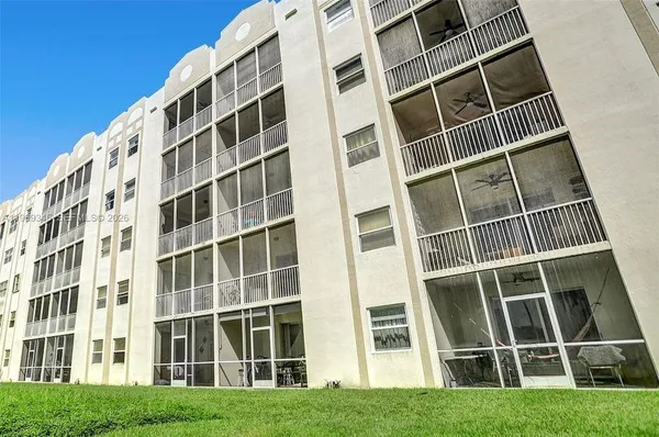 a view of swimming pool from a balcony
